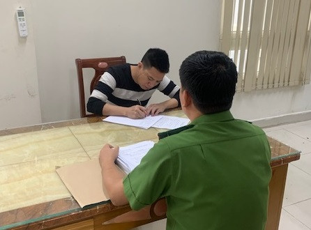 Đối tượng Nguyễn Văn Giang đầu thú tại Cơ quan Cảnh sát điều tra. Ảnh: CAQN
