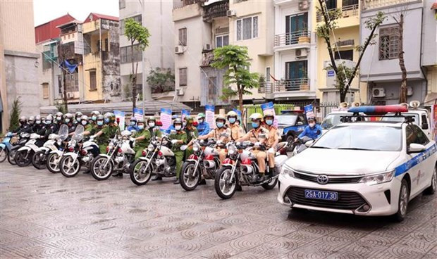 Lực lượng công an thành phố Hà Nội ra quân đảm bảo trật tự bầu cử đại biểu Quốc hội và HĐND các cấp. (Ảnh: Phạm Kiên/TTXVN)