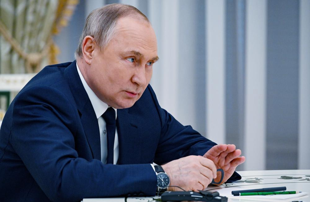 Tổng thống Nga Vladimir Putin tại cuộc gặp. Ảnh: AP.