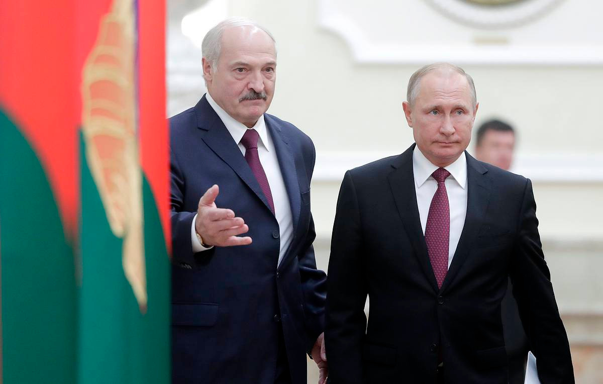 Tổng thống Nga Vladimir Putin và người đồng cấp Belarus Alexander Lukashenko. Ảnh: TASS.