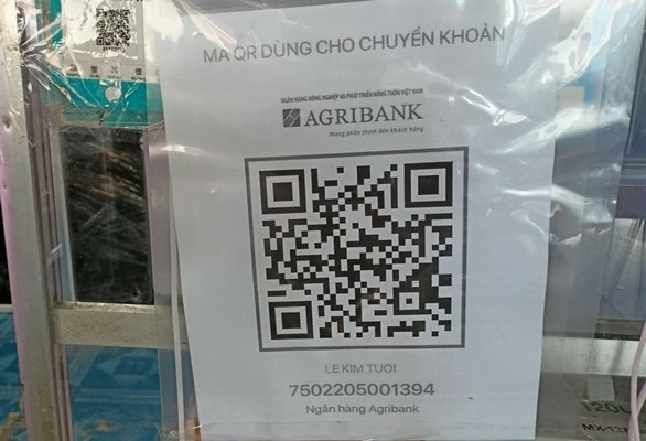 Mã QR tài khoản thanh toán trực tuyến được đặt tại các cửa hàng ở chợ 4.0.