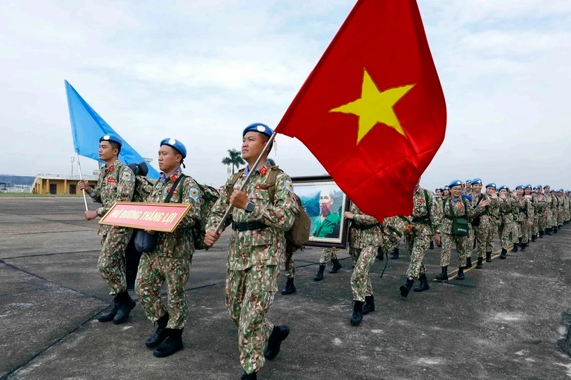 Lực lượng Gìn giữ Hòa bình Việt Nam xuất quân tại Sân bay Quốc tế Nội Bài (Hà Nội), lên đường thực hiện nhiệm vụ của Liên hợp quốc tại Phái bộ UNISFA. (Ảnh: An Đăng/TTXVN)
