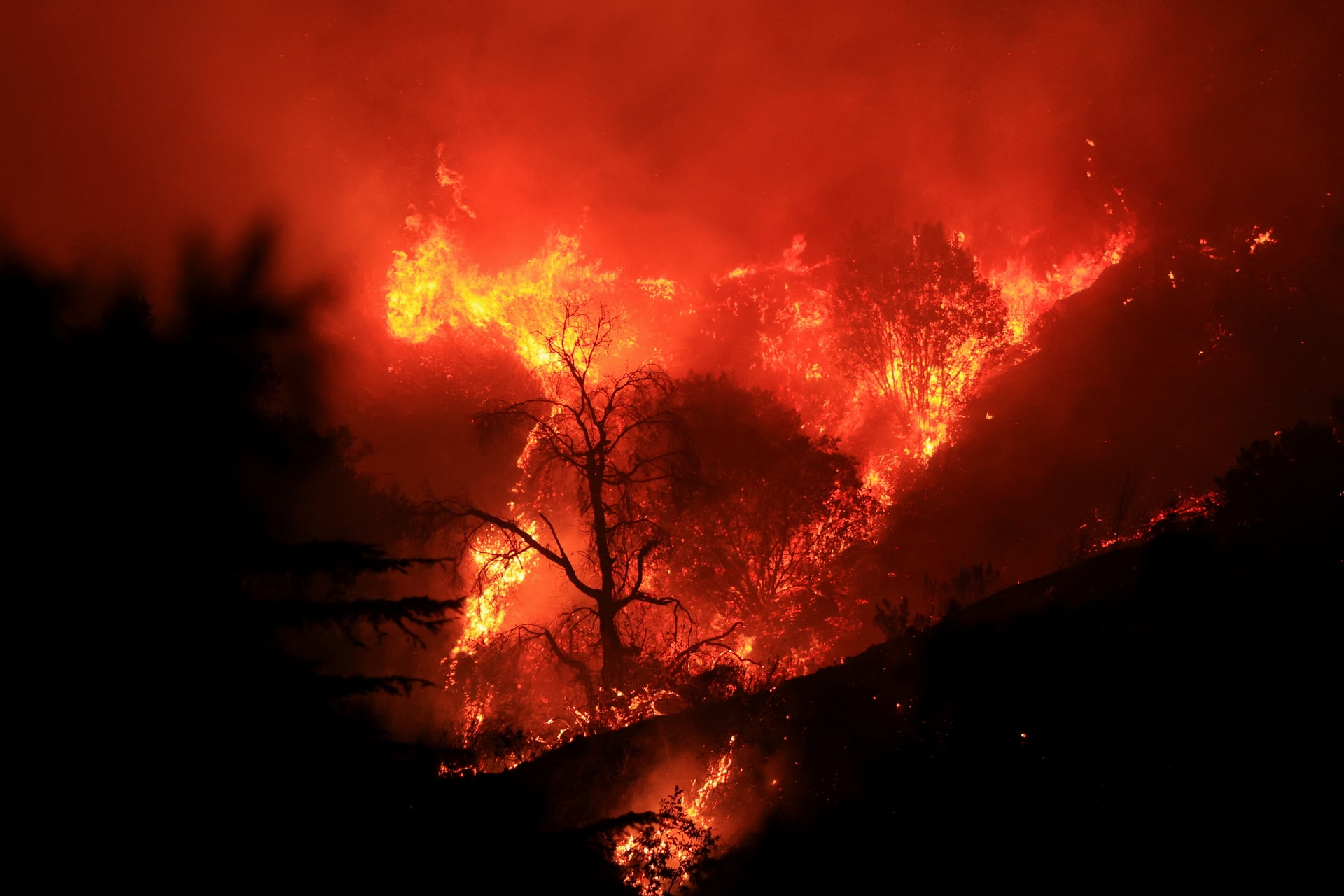 Smoke billows from the Mountain Fire, in California