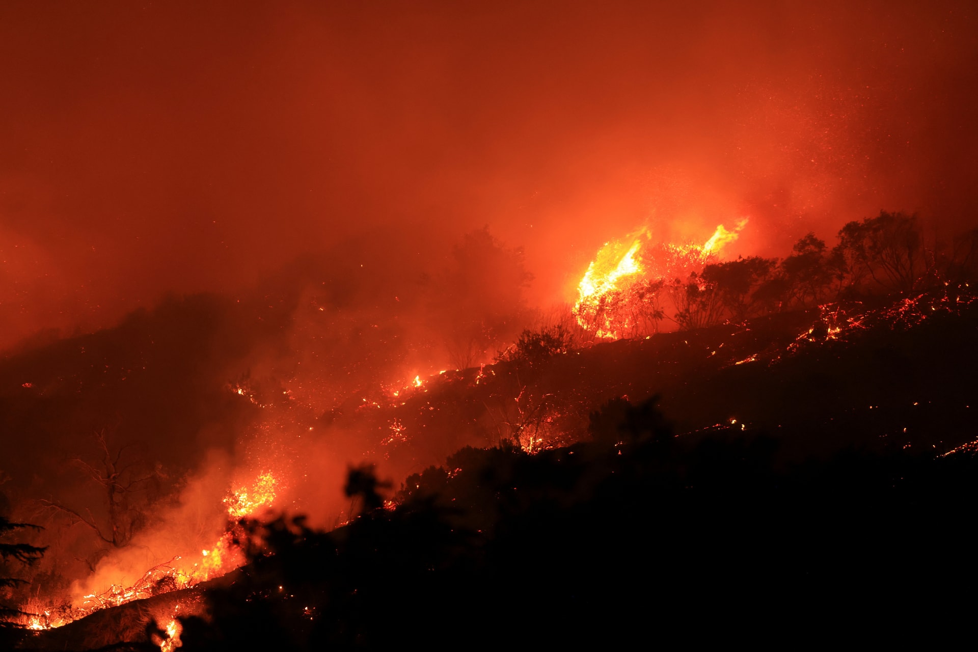 Smoke billows from the Mountain Fire, in California