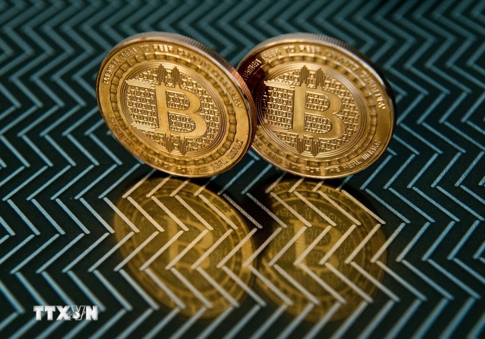 Đồng tiền kỹ thuật số bitcoin. (Ảnh: AFP/TTXVN)