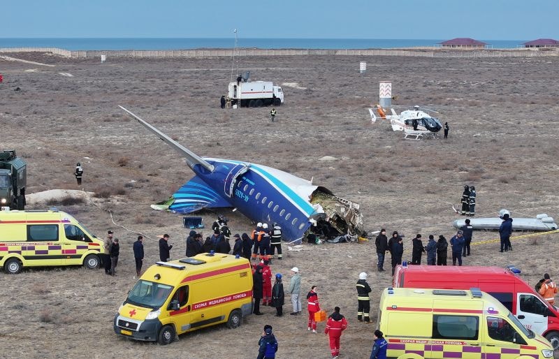 A drone view shows emergency specialists working at the crash site of an Azerbaijan Airlines passenger plane near the city of Aktau, Kazakhstan December 25, 2024. REUTERS/Azamat Sarsenbayev