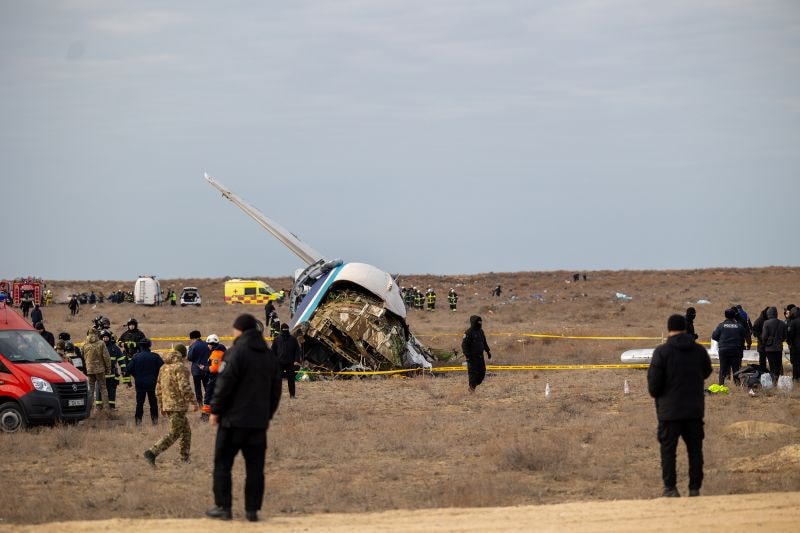 AKTAU, KAZAKHSTAN - DECEMBER 25: A view of the scene after an Azerbaijan Airlines flight with 67 people on board, traveling from the Azerbaijani capital Baku to Grozny in Russia's Chechnya region, crashed near the Kazakh Caspian city of Aktau on December 25, 2024. According to the ministry, 62 passengers and five crew members were on board Flight 8432, which caught fire following the crash, adding that emergency responders are working to extinguish it. (Photo by Issa Tazhenbayev/Anadolu via Getty Images)