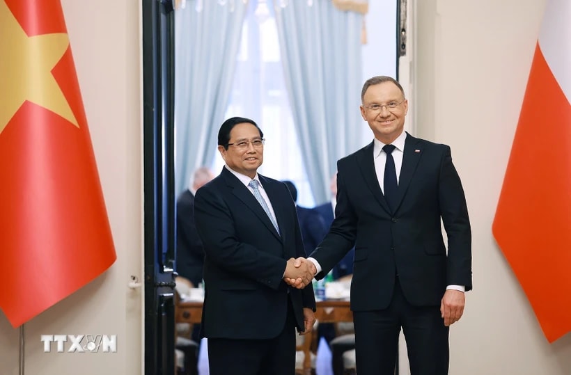 Thủ tướng Phạm Minh Chính hội kiến Tổng thống Ba Lan Andrzej Duda. (Ảnh: Dương Giang/TTXVN)