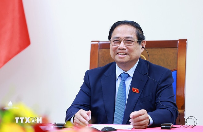 ttxvn-thu-tuong-pham-minh-chinh-dien-dam-voi-thu-tuong-singapore-1.jpg