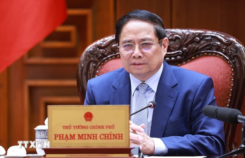 Thủ tướng Phạm Minh Chính chủ trì cuộc họp về đảm bảo cân bằng thương mại với Hoa Kỳ. (Ảnh: Dương Giang/TTXVN)