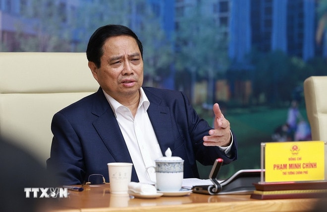 ttxvn-thu-tuong-chu-tri-hoi-nghi-so-ket-viec-thuc-hien-chi-tieu-phat-trien-nha-o-xa-hoi6.jpg