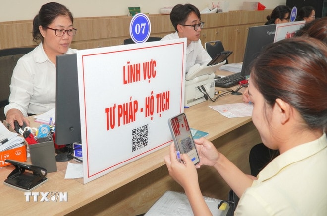 ttxvn-chinh-quyen-dia-phuong-hai-cap-thanh-pho-ho-chi-minh-2.jpg